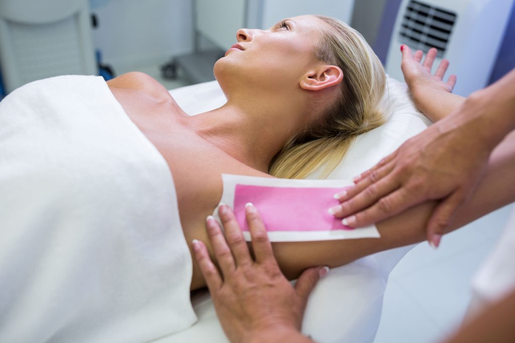 woman getting her armpit hair removed img